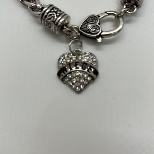 Niece heart charmed cubic zirconia silver toned bracelet
